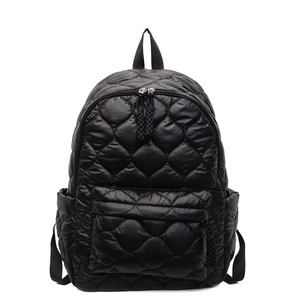 Black quilted space cotton backpack for women featuring lightweight puffer design and pockets