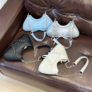 Quilted ballet style shoulder bags in blue, silver, black and beige with bow ribbons