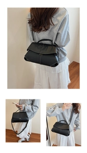 Detailed views of black pebbled leather handbag with white contrast stitching and straps