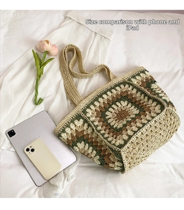 Detail of granny square crochet tote bag showing large capacity for iPad and phone