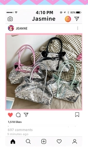 Detail view of four sequin tote bags in pink, black, silver and mint green colors
