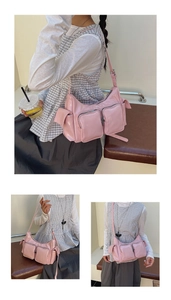 Pink glossy Y2K multi-pocket shoulder bag with metallic zippers and adjustable strap