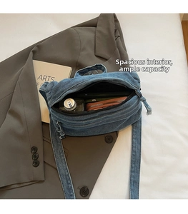 Top view of blue denim tote bag interior showing large capacity for daily items