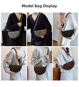Detail of studded crescent shoulder bag shown in various colors on a model in warm light