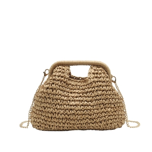 Fashionable khaki woven straw handbag with gold chain strap for summer beach vacation