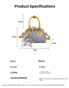 Detailed dimension guide for blue denim bowling bag with yellow handles and star charms