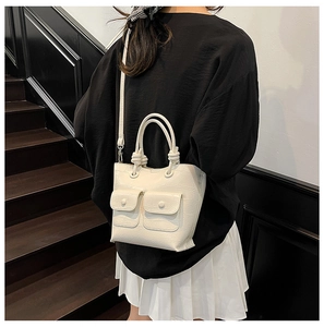 Chic cream white crocodile pattern handbag with front pockets and elegant handle