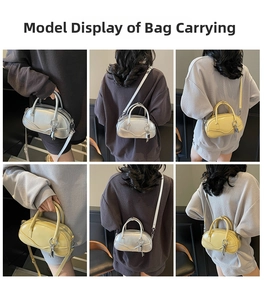 Detail view of retro bowling handbag showing silver and yellow colors with shoulder strap