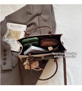 Top view of two-tone tote bag interior showing spacious storage for daily essentials