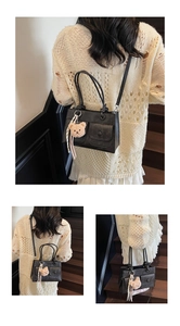 Detailed views of a black tote bag with plush bear charm and multi-pocket design features