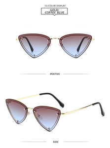 Detail view showing Gold and Coffee Blue gradient lens on triangle rimless sunglasses