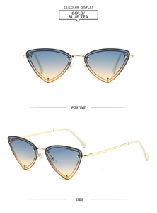 Detailed macro view of trendy triangle metal sunglasses with blue tea gradient lenses