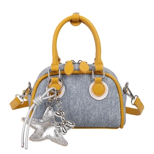 Minimalist blue denim and yellow leather crossbody bag with silver star charm