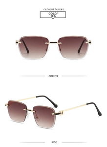Vue détaillée des lunettes de soleil carrées sans monture avec monture dorée et verres thé