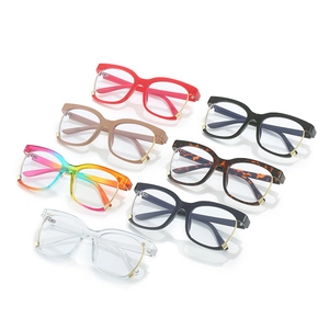 Flat lay of square fashion eyeglass frames in seven colors with gold metal details