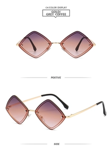 Détail de lunettes de soleil géométriques dorées avec verres dégradés violet-marron