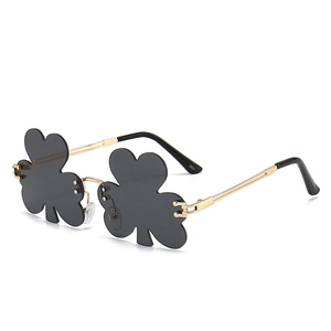 Fashion rimless clover leaf sunglasses with gold metal frame and dark grey lenses
