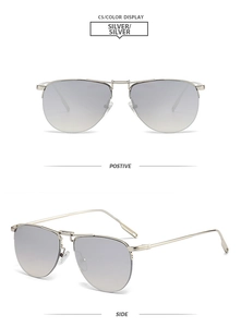 Detail view of silver metal double bridge aviator sunglasses with gradient grey lenses