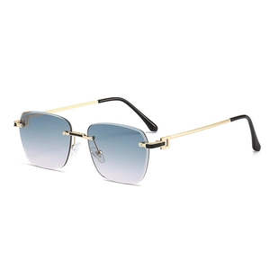 Lunettes de soleil carrées sans monture avec verres dégradés bleus et monture dorée