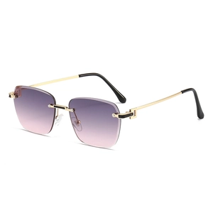 Lunettes de soleil carrées sans monture avec branches dorées et verres dégradés