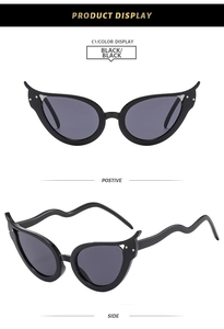 Lunettes œil-de-chat avec monture ailes de chauve-souris, rivets et branches effet serpent