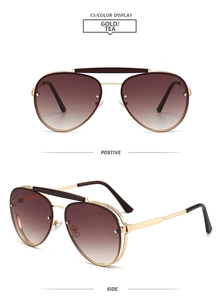 Front and side views of gold double-bridge pilot sunglasses with tea gradient lenses