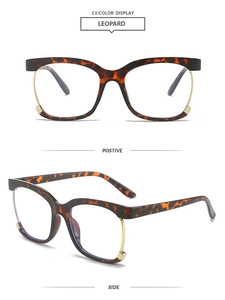 Detail view of leopard print square glasses frames with stylish gold metal hinges