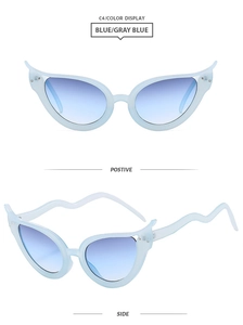 Lunettes œil-de-chat avec verres dégradés bleus et branches ondulées élégantes