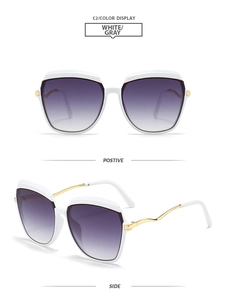 Detail of square white sunglasses featuring gold wavy metal temples and purple gradient lenses