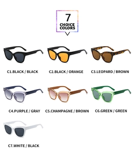 Matrice di sette eleganti occhiali da sole cat-eye in vari colori e motivi di montatura