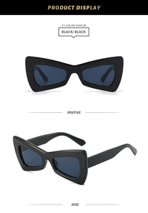 Close-up of black butterfly-shaped Y2K fashion sunglasses showing front and side views