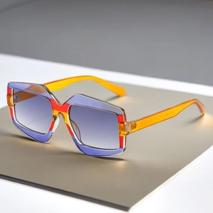 Detailed macro view of geometric multi-color block frames and purple gradient lenses