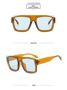 Detail view of square flat top sunglasses with tea frames and light blue lenses