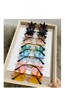 Detailed top view of rimless maple leaf sunglasses in multiple gradient color variations