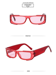 Detail view of Y2K rectangle sunglasses with transparent red frame and pink lenses