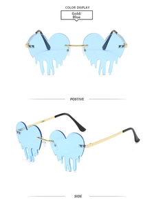 Détails de lunettes de soleil sans monture en forme de cœur avec verres larmes bleues