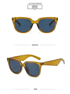 Détail de la monture ambre jaune et des verres bleu foncé de ces lunettes de soleil