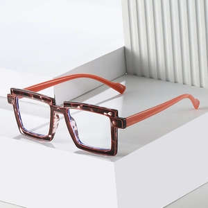 Two-tone TR90 blue light blocking glasses with tortoiseshell frame and neon orange temples