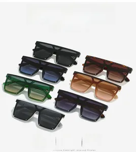 Flat lay of square oversized sunglasses in seven trendy color combinations on white