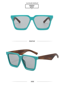 Detailed view of teal square frames with gray lenses and brown wood texture temples
