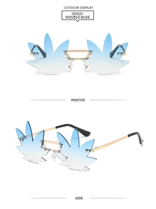 Detail of rimless maple leaf sunglasses with gold metal frame and blue gradient lenses
