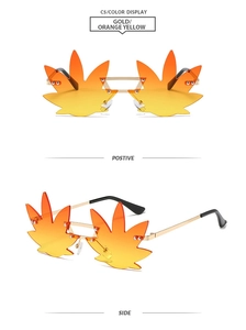 Macro detail of rimless maple leaf sunglasses with orange gradient lenses and gold frame