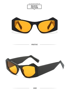 Detail view of irregular punk sunglasses with black frame and yellow tinted lenses