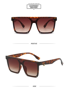 Detail of leopard print square oversized sunglasses with gold hinges and gradient brown lenses