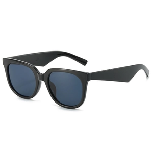 Lunettes de soleil carrées surdimensionnées avec monture noire brillante et verres bleus