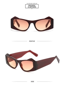 Macro detail of irregular thick-frame sunglasses in deep burgundy with gradient brown lenses