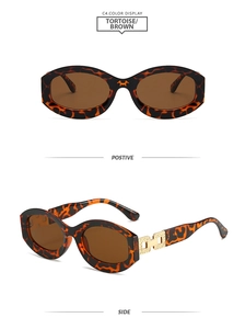 Détails des lunettes de soleil écaillées avec verres bruns et charnières dorées chic
