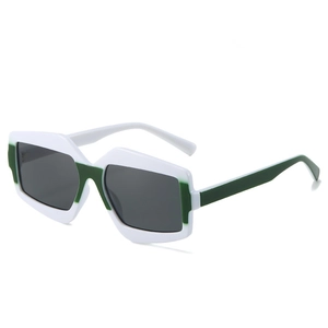 Modern geometric sunglasses with bold white and green contrast frame for a luxury look