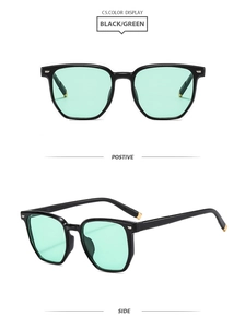 Détails des lunettes carrées avec monture noire, verres vert menthe et accents dorés