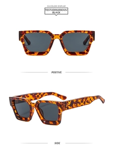 Detailansicht der quadratischen Sonnenbrille mit Leopardenmuster und dunklen Gläsern